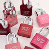 Collection of 'Gige bear' lip glosses in various shades on a light background