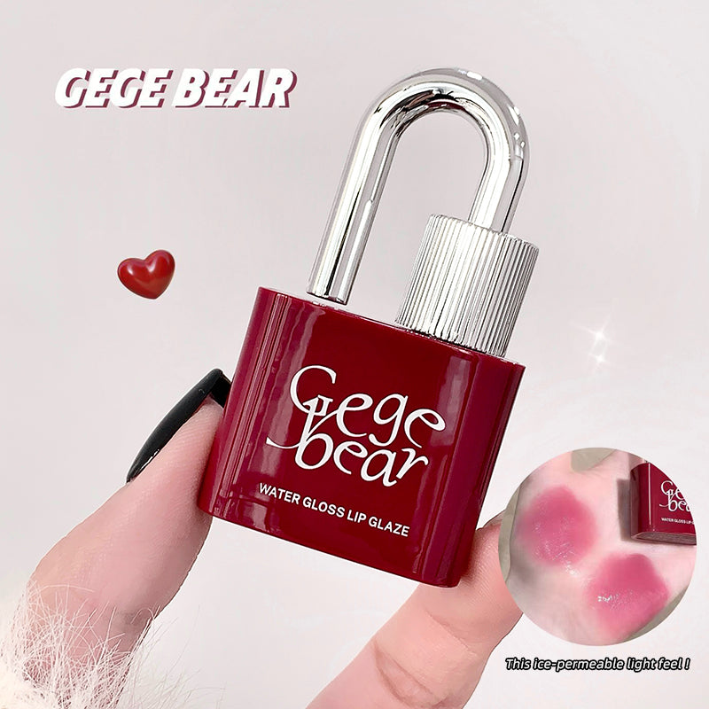 Red lock-shaped lip gloss with 'GEGE BEAR' branding on a light gray background.