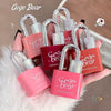 Pink lock-shaped lip glosses with 'Gege Bear' branding held by a hand.